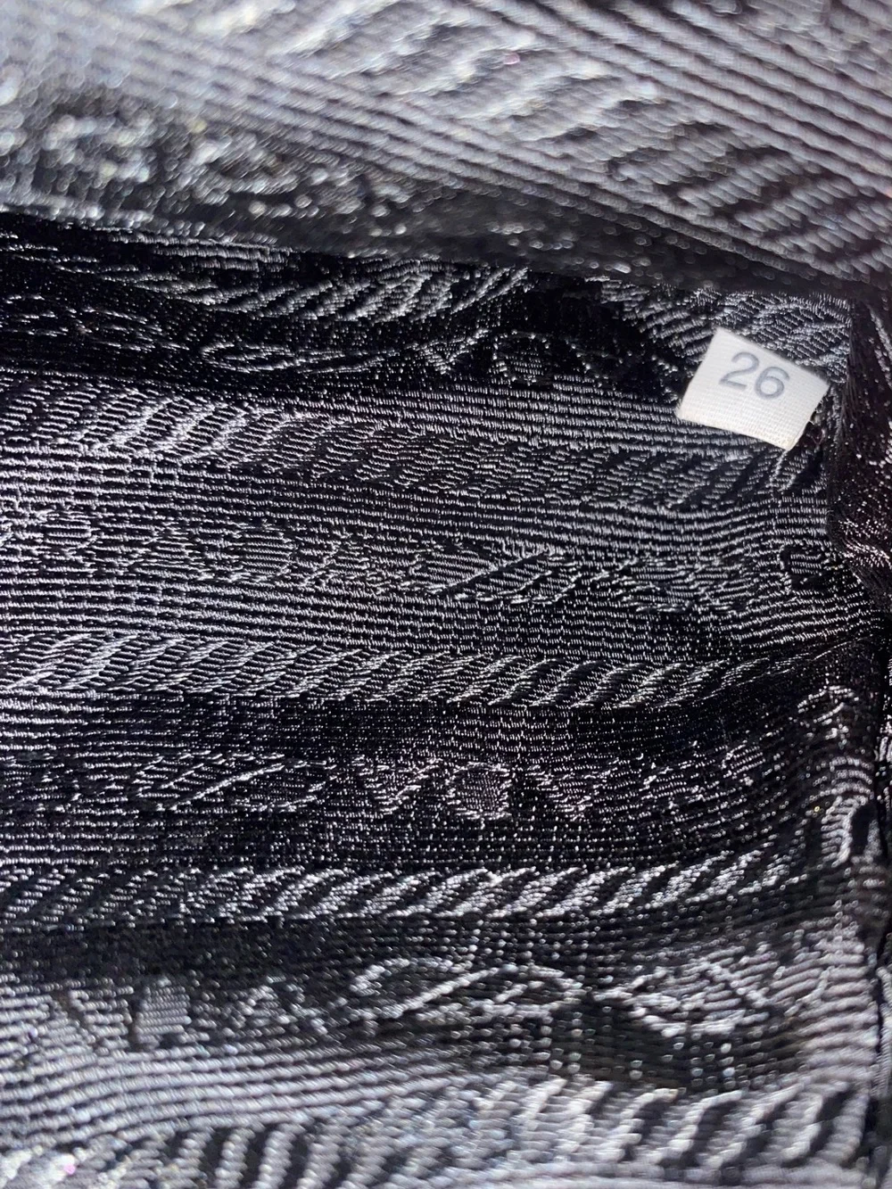 PRADA MINI CIRCLE QUILTED BAG/WRISTLET